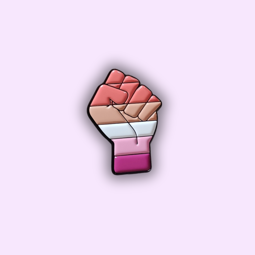 Pin's "Poing de la Féminité"