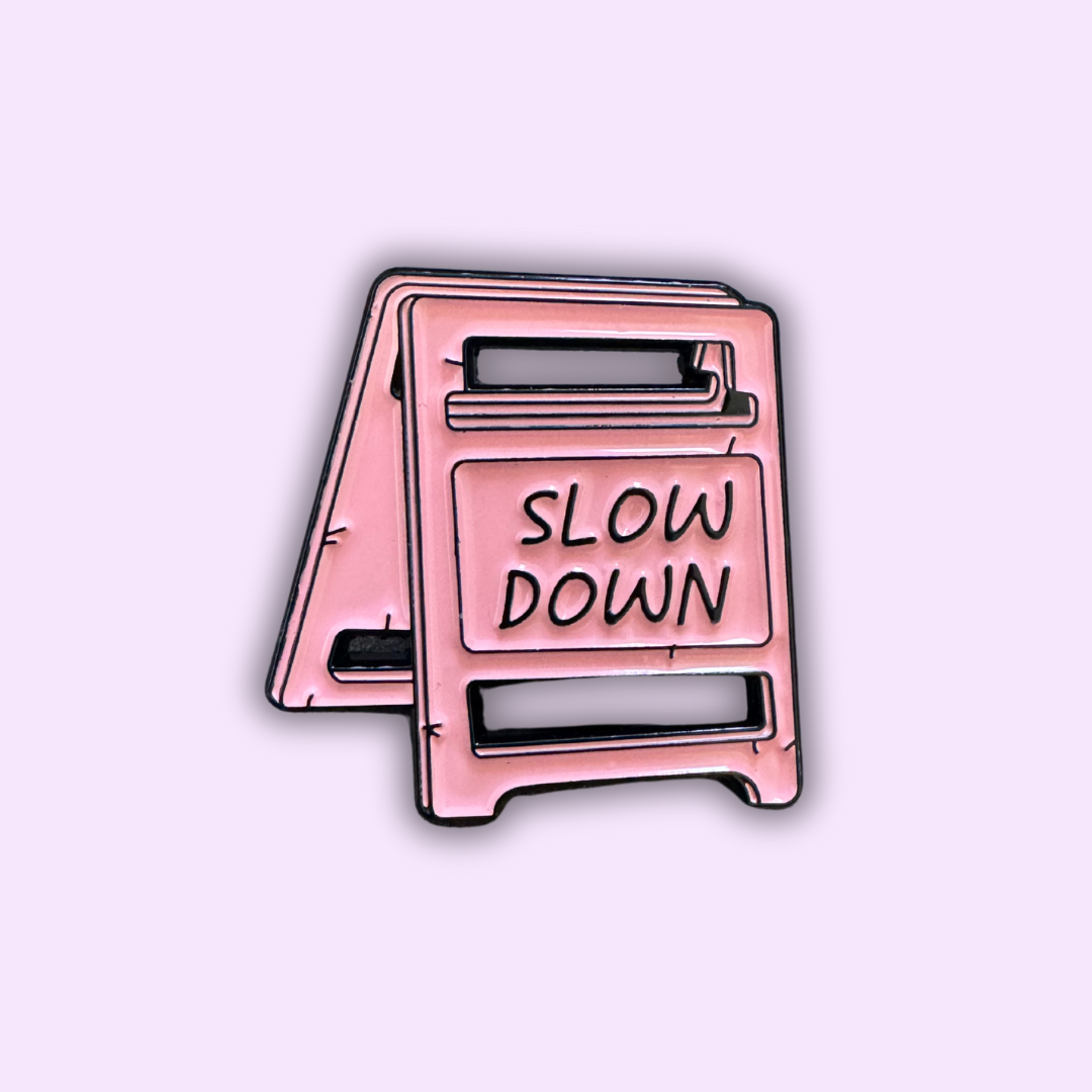 Pin's "SLOW DOWN"