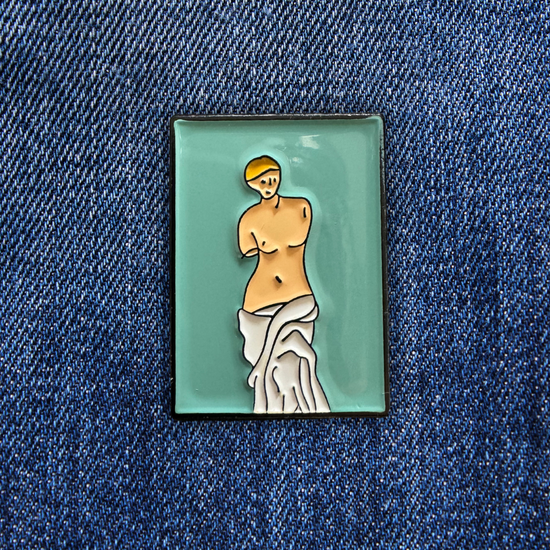 Pins Vénus de Milo sur un jean