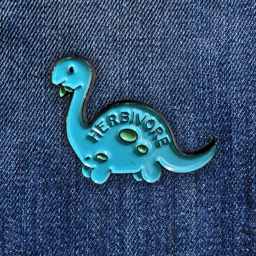 Pins Dinosaure Brachio Herbivore sur un jean