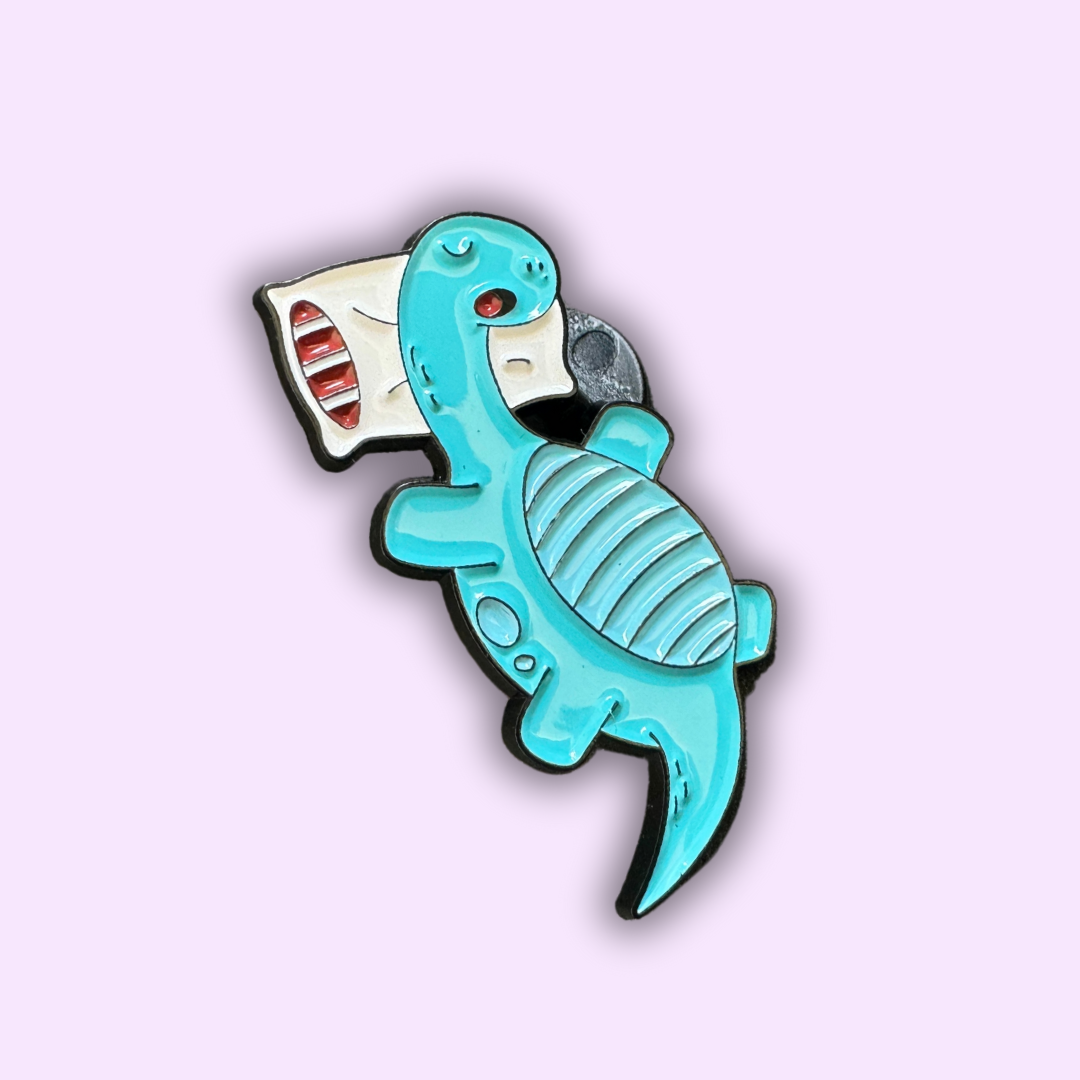 Pin's Dinosaure "Brachiosaure Endormi"